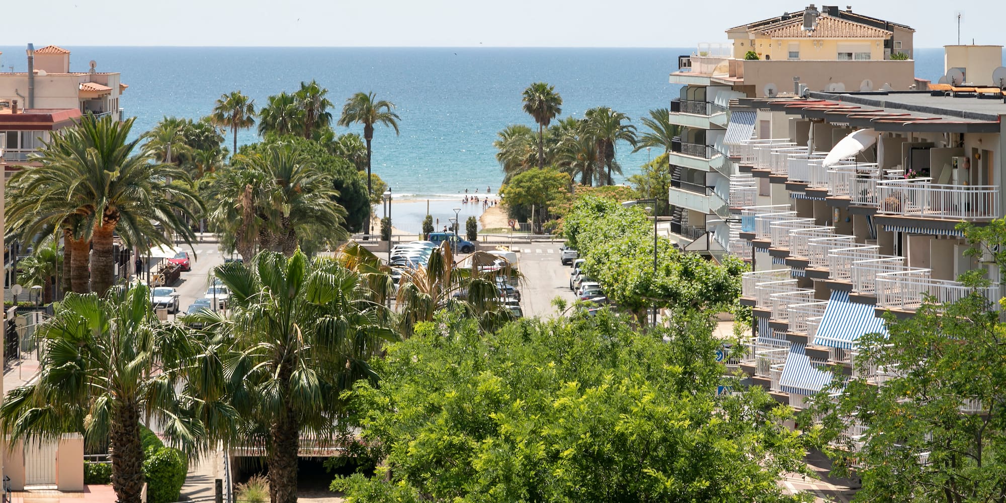a view of a beach and buildings from a high angle