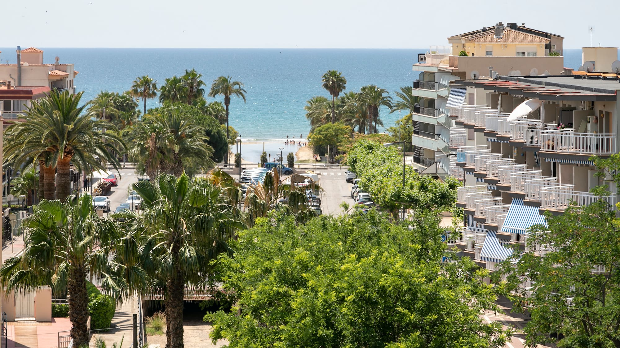 a view of a beach and buildings from a high angle