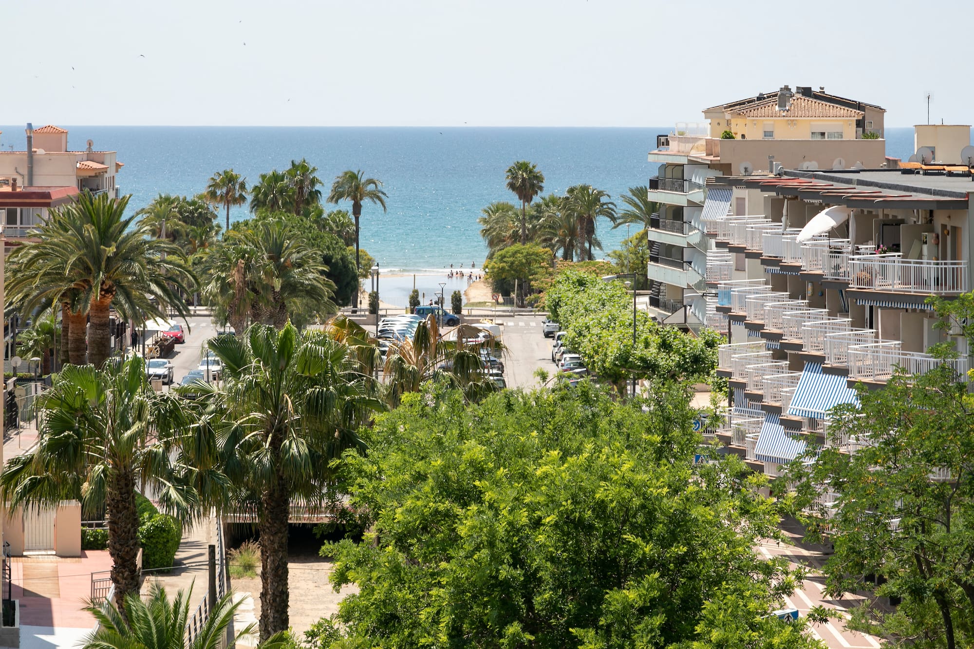 a view of a beach and buildings from a high angle
