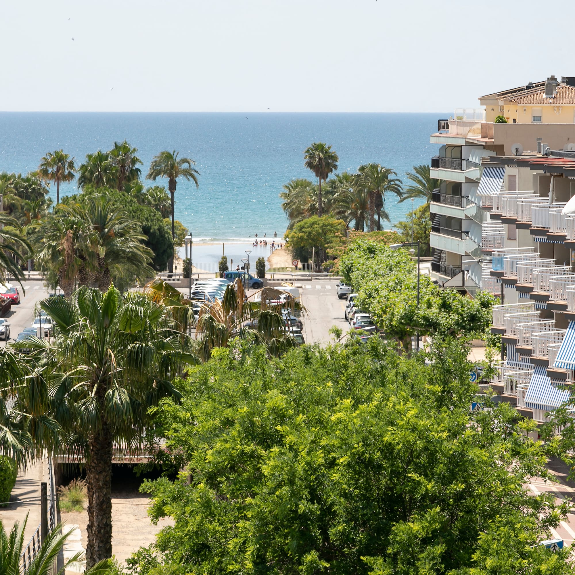 a view of a beach and buildings from a high angle