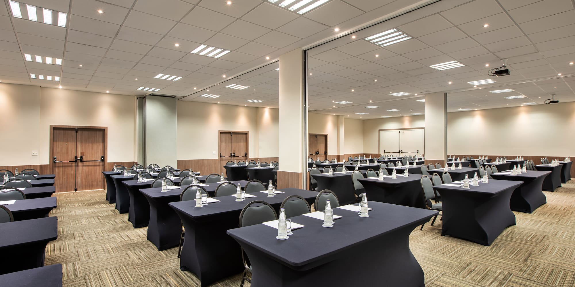 a room with tables and chairs