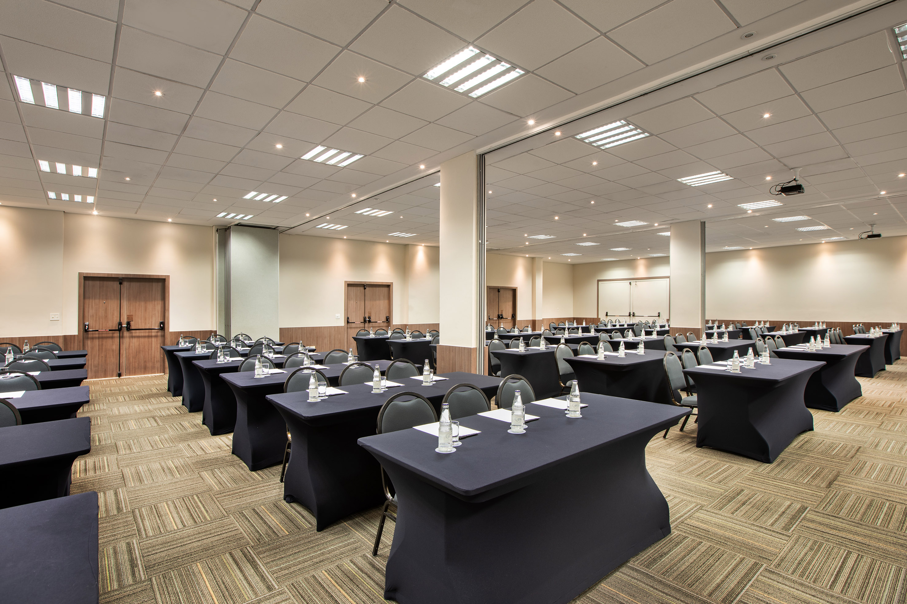 a room with tables and chairs