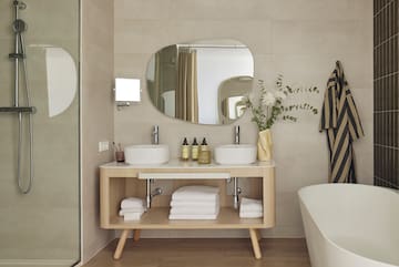a bathroom with a mirror and sink