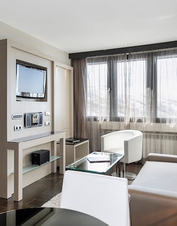 a room with a tv and a couch