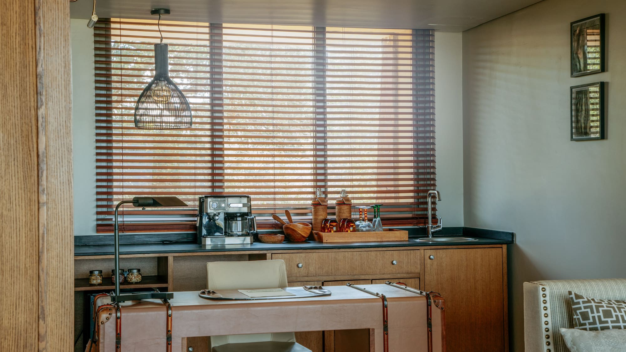 a kitchen with a table and chairs