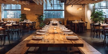 a large table set for a dinner party