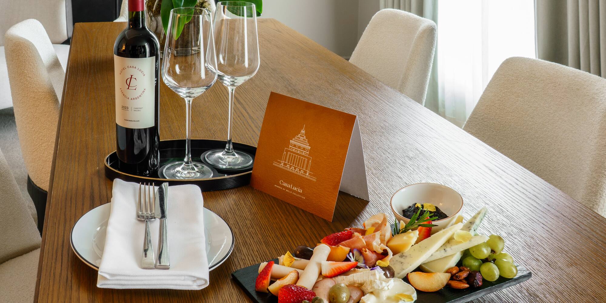 a table with wine and food on it