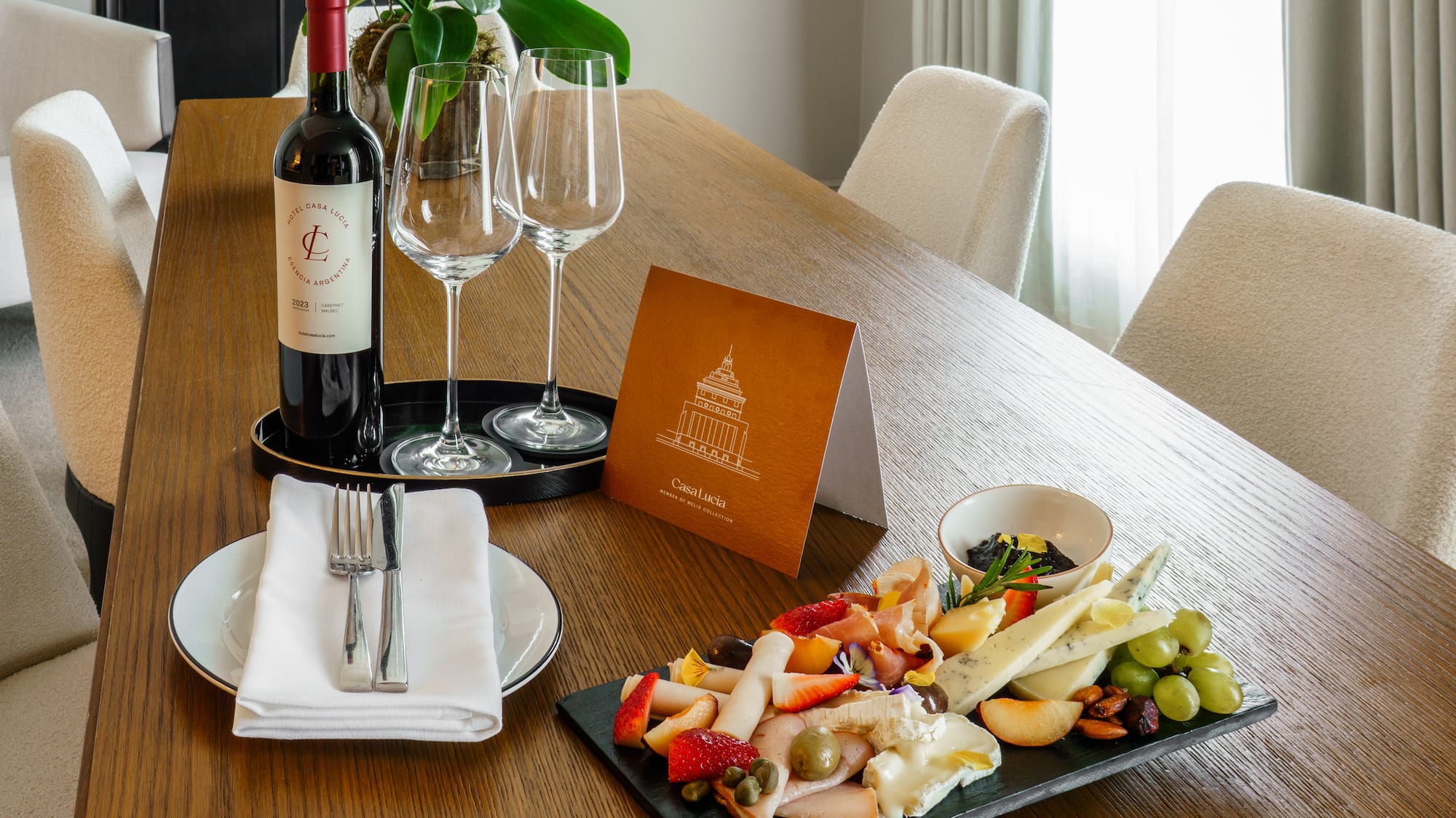 a table with wine and food on it