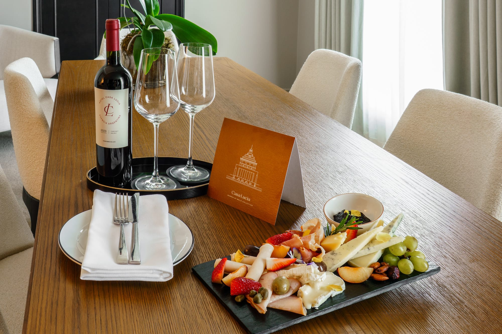 a table with wine and food on it