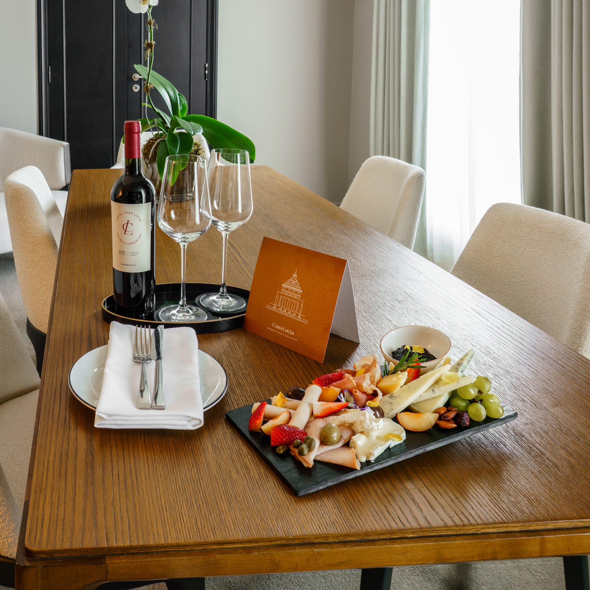 a table with wine and food on it