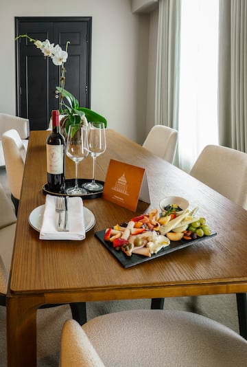 a table with wine and food on it