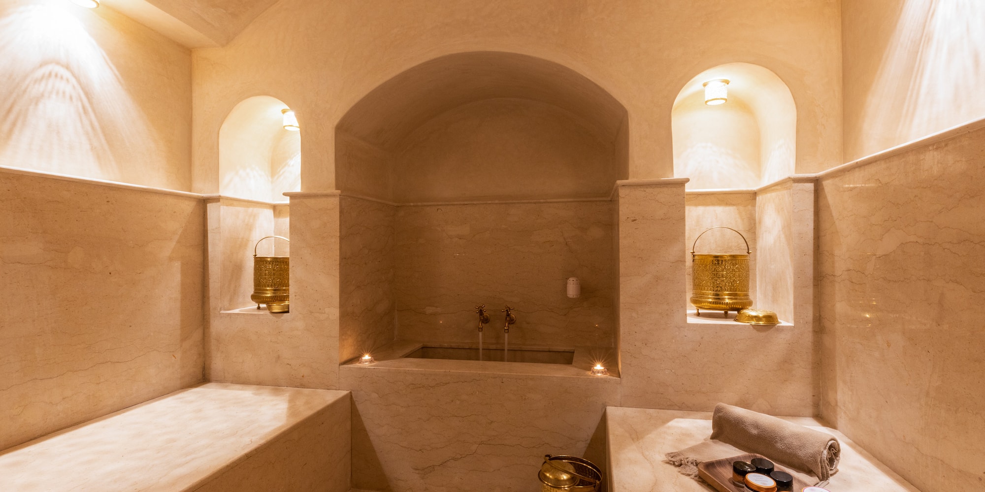a bathroom with a bathtub and a tub
