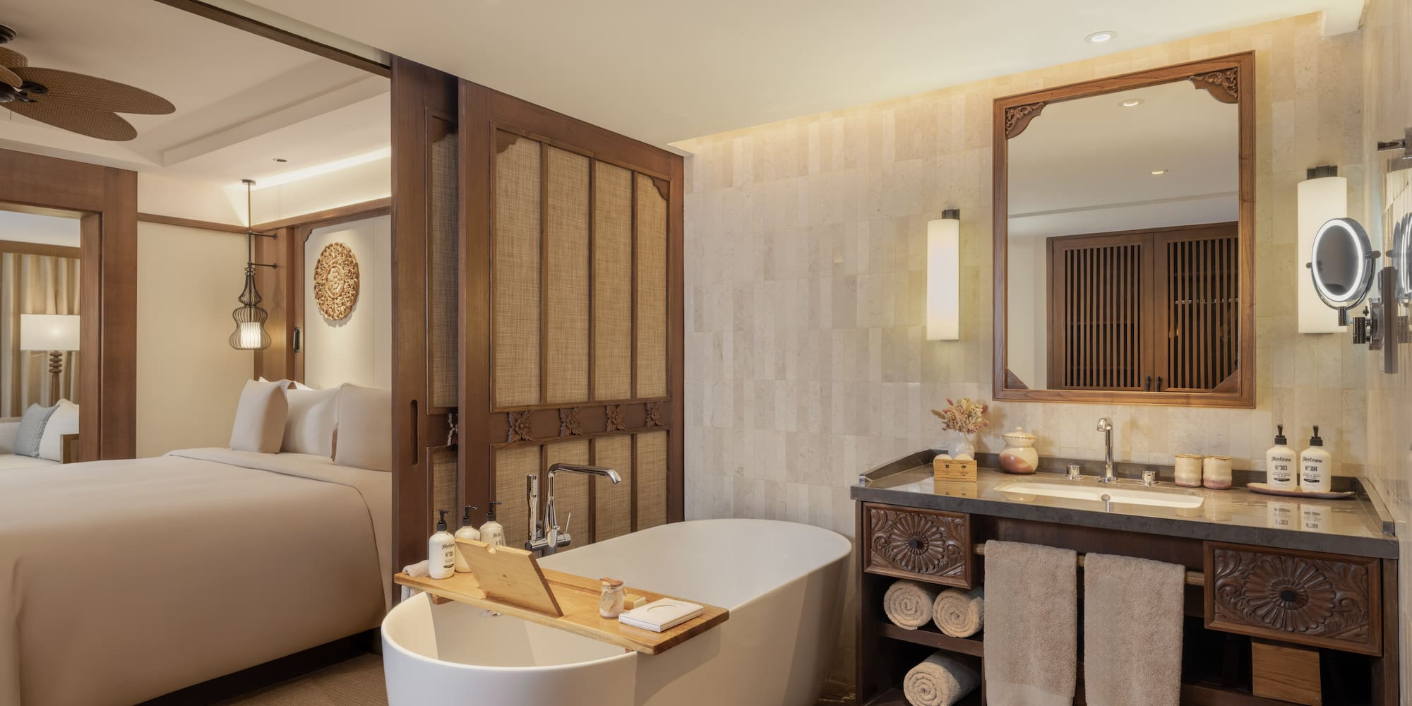 a bathroom with a bathtub and a mirror