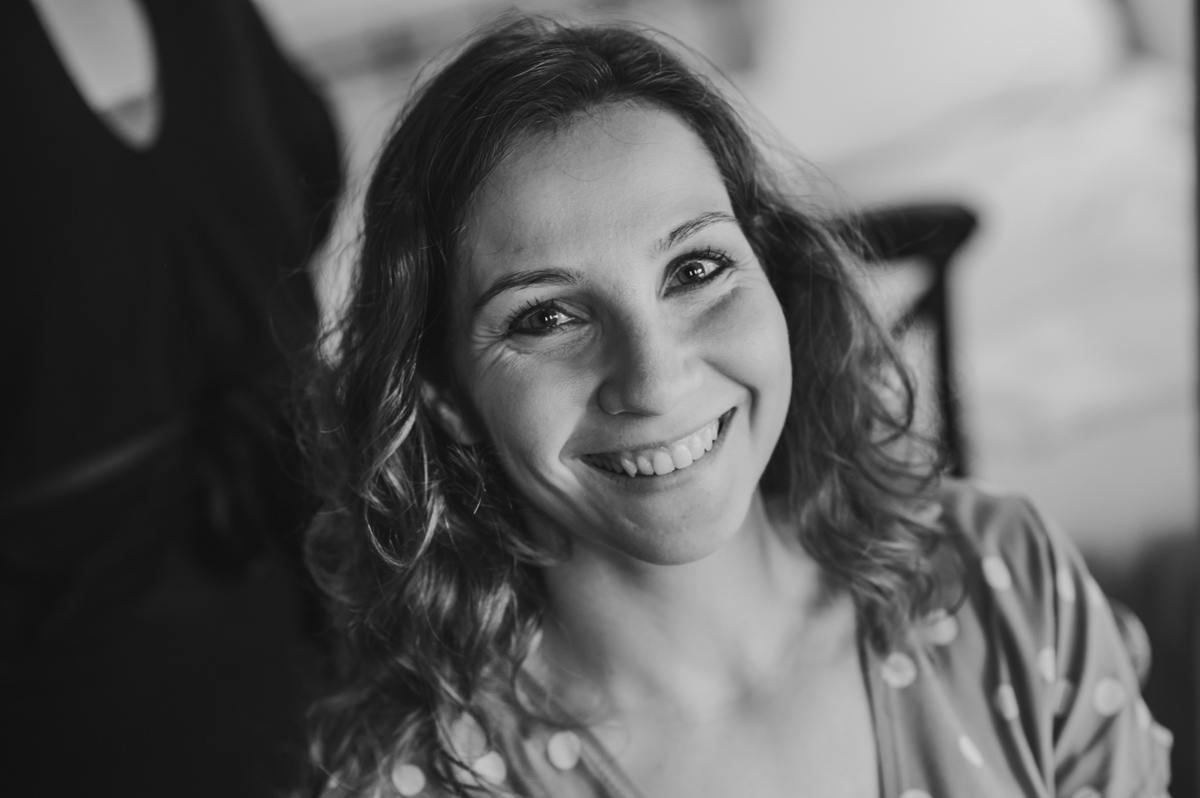 a woman smiling at the camera