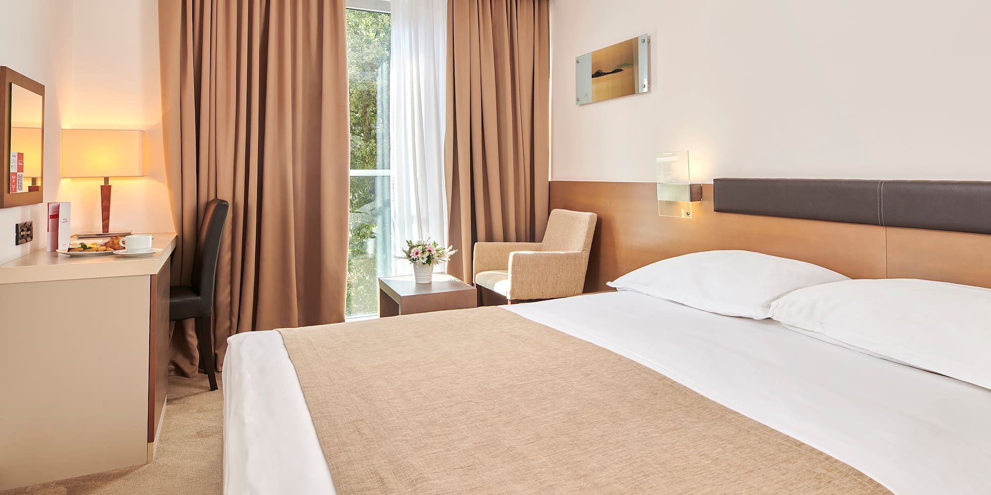 a bed in a hotel room