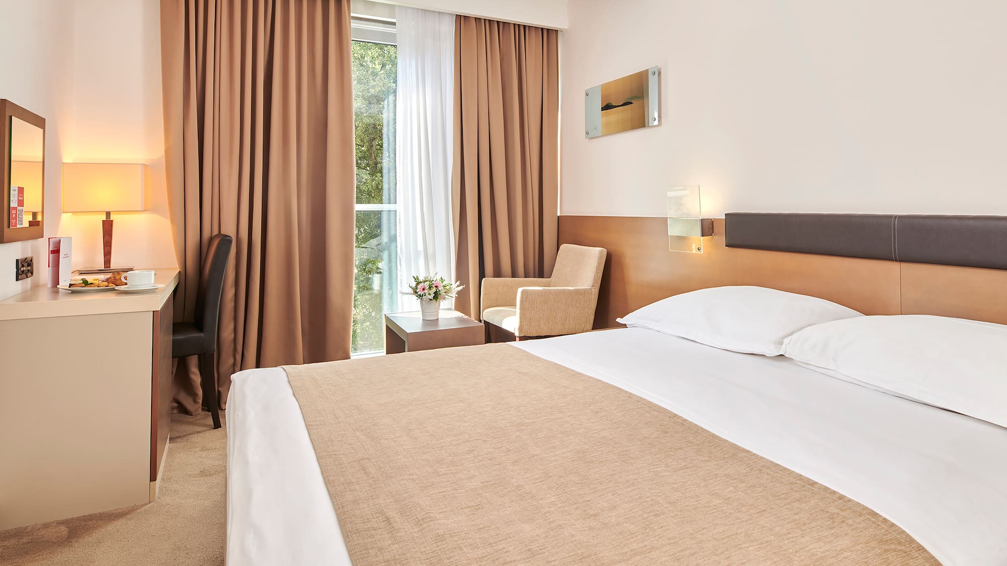 a bed in a hotel room