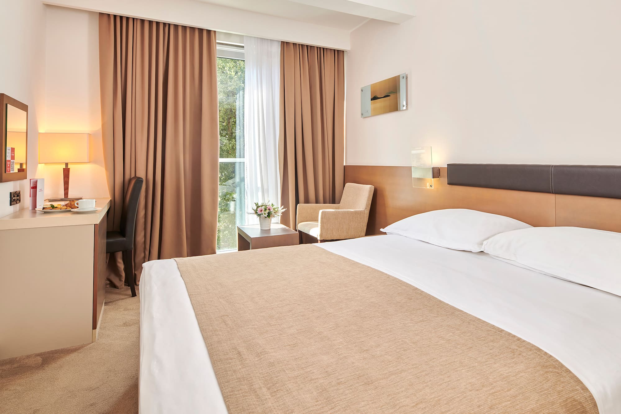 a bed in a hotel room