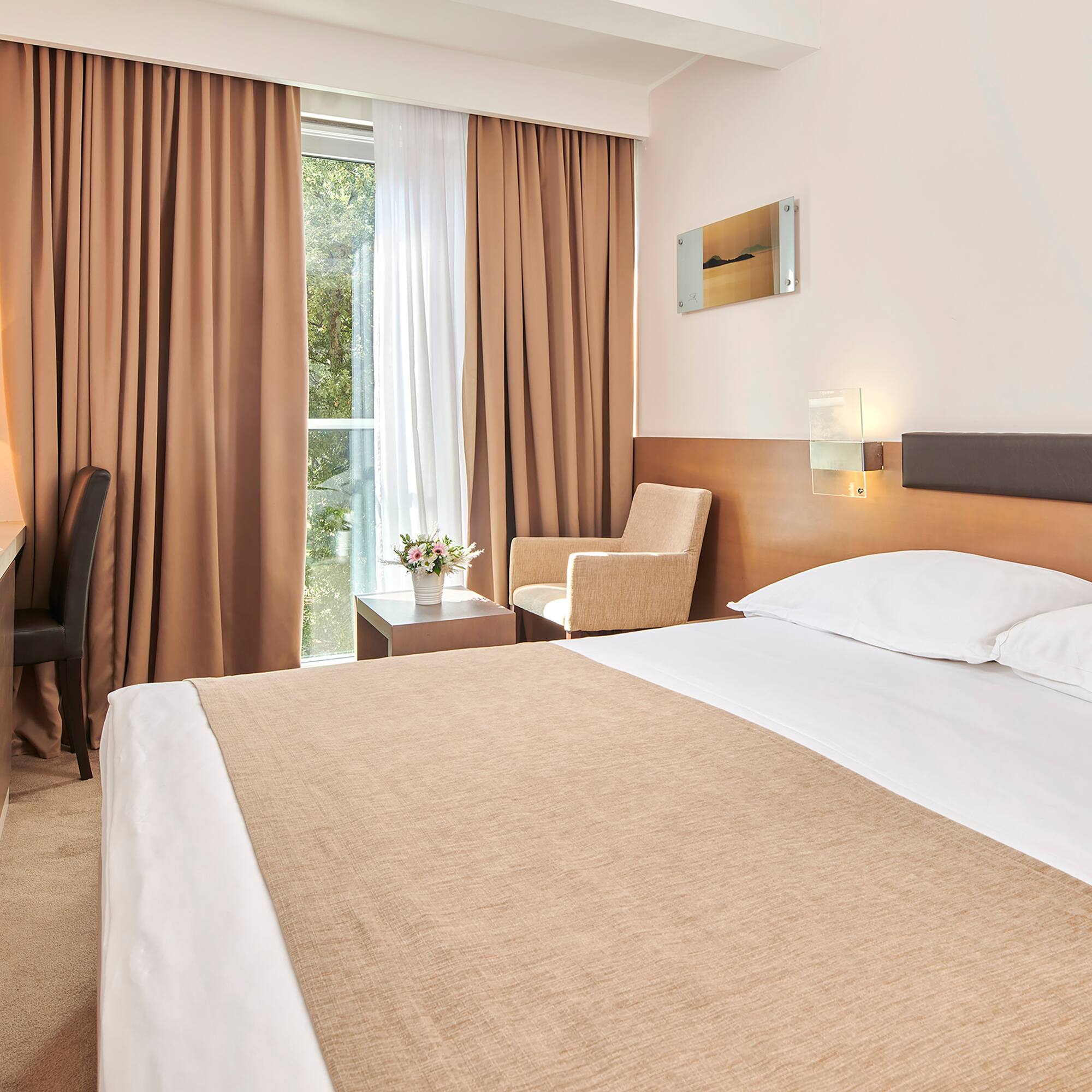 a bed in a hotel room