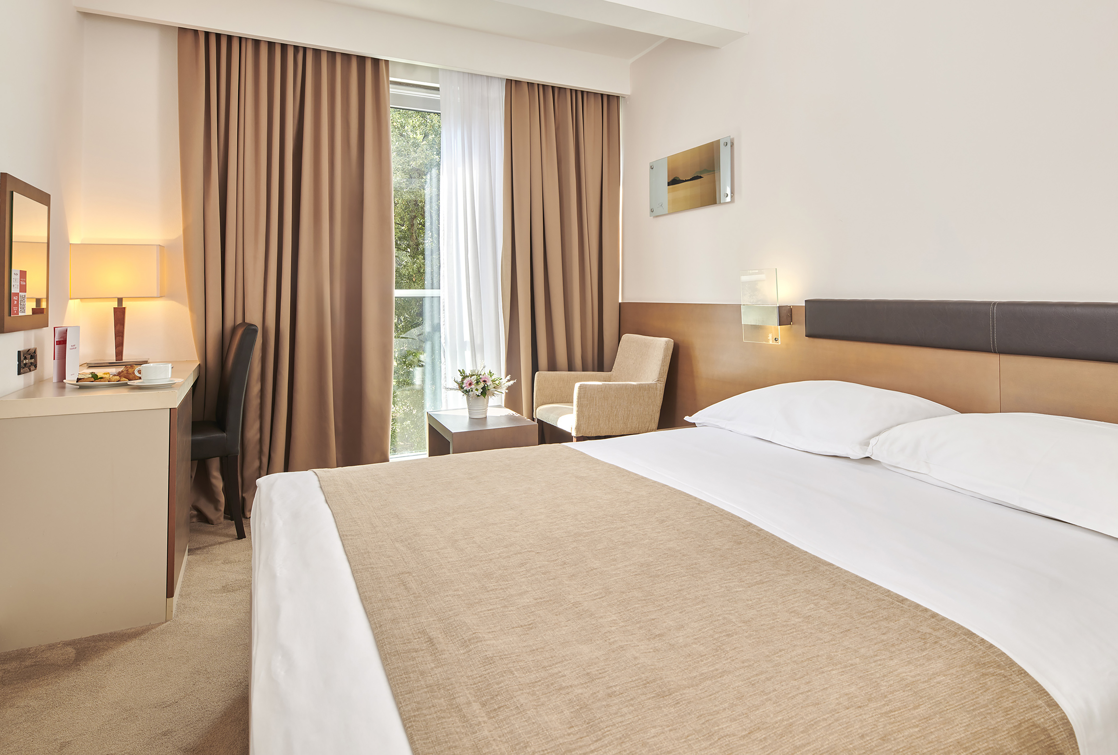 a bed in a hotel room