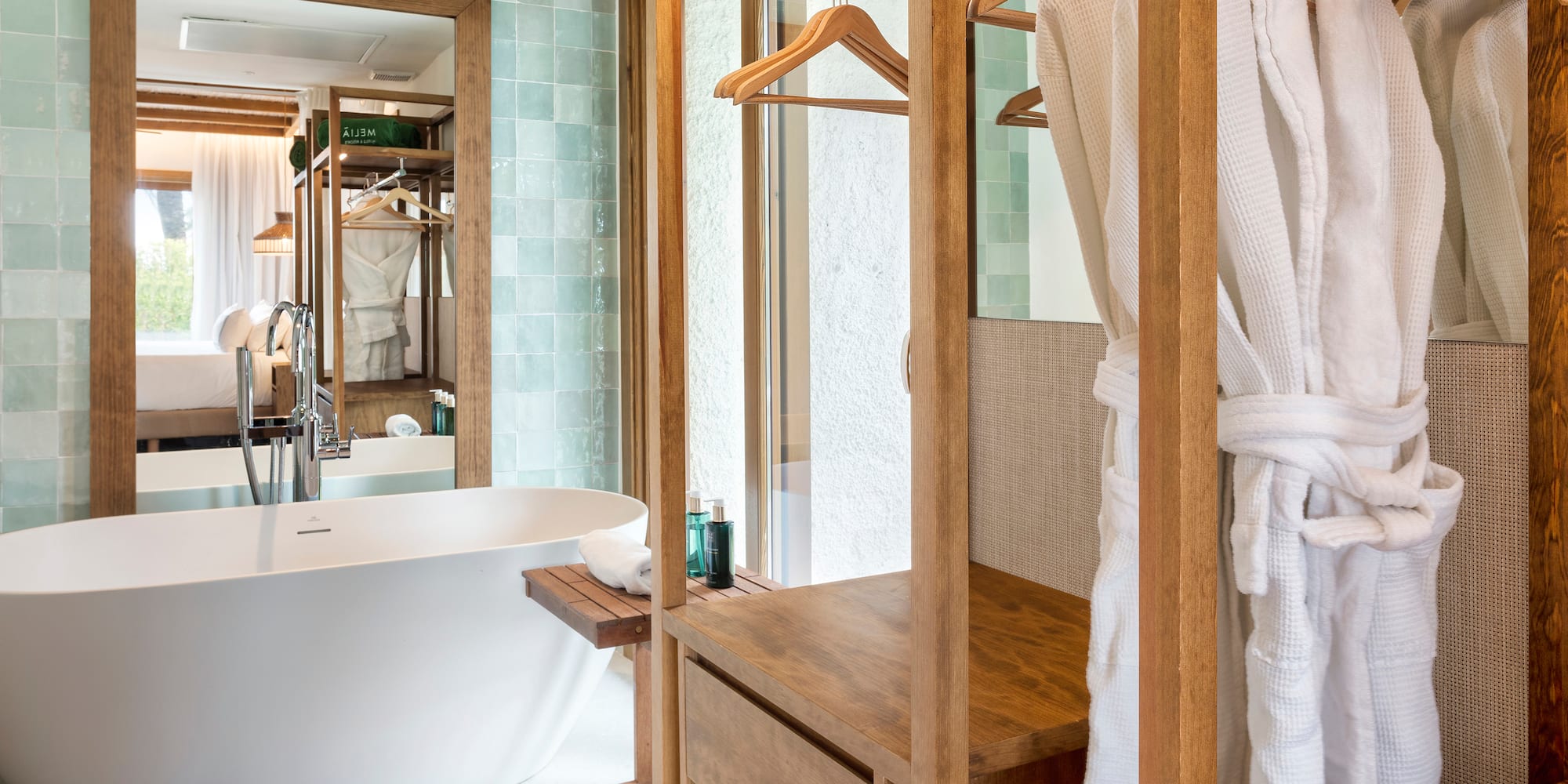 a bathroom with a bathtub and a bathtub