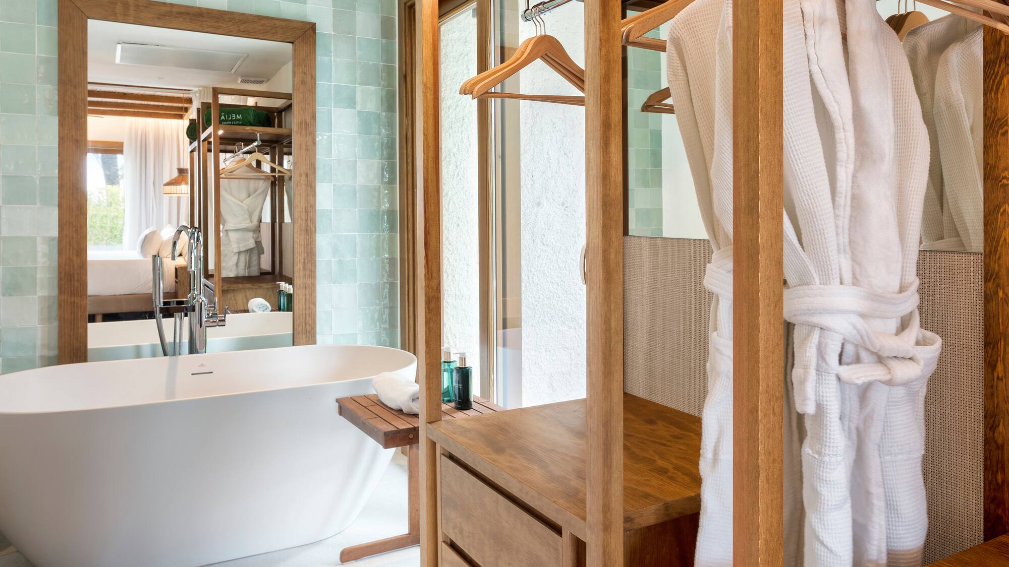 a bathroom with a bathtub and a bathtub