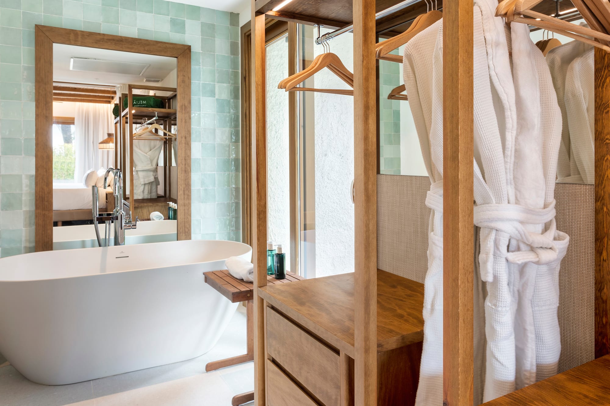 a bathroom with a bathtub and a bathtub