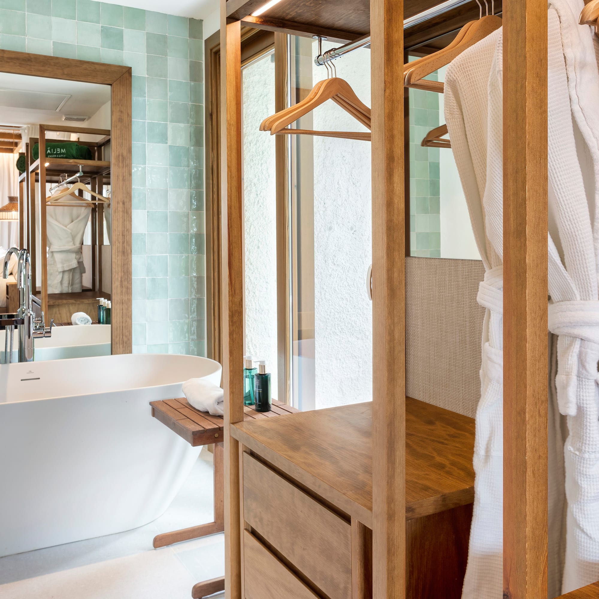 a bathroom with a bathtub and a bathtub