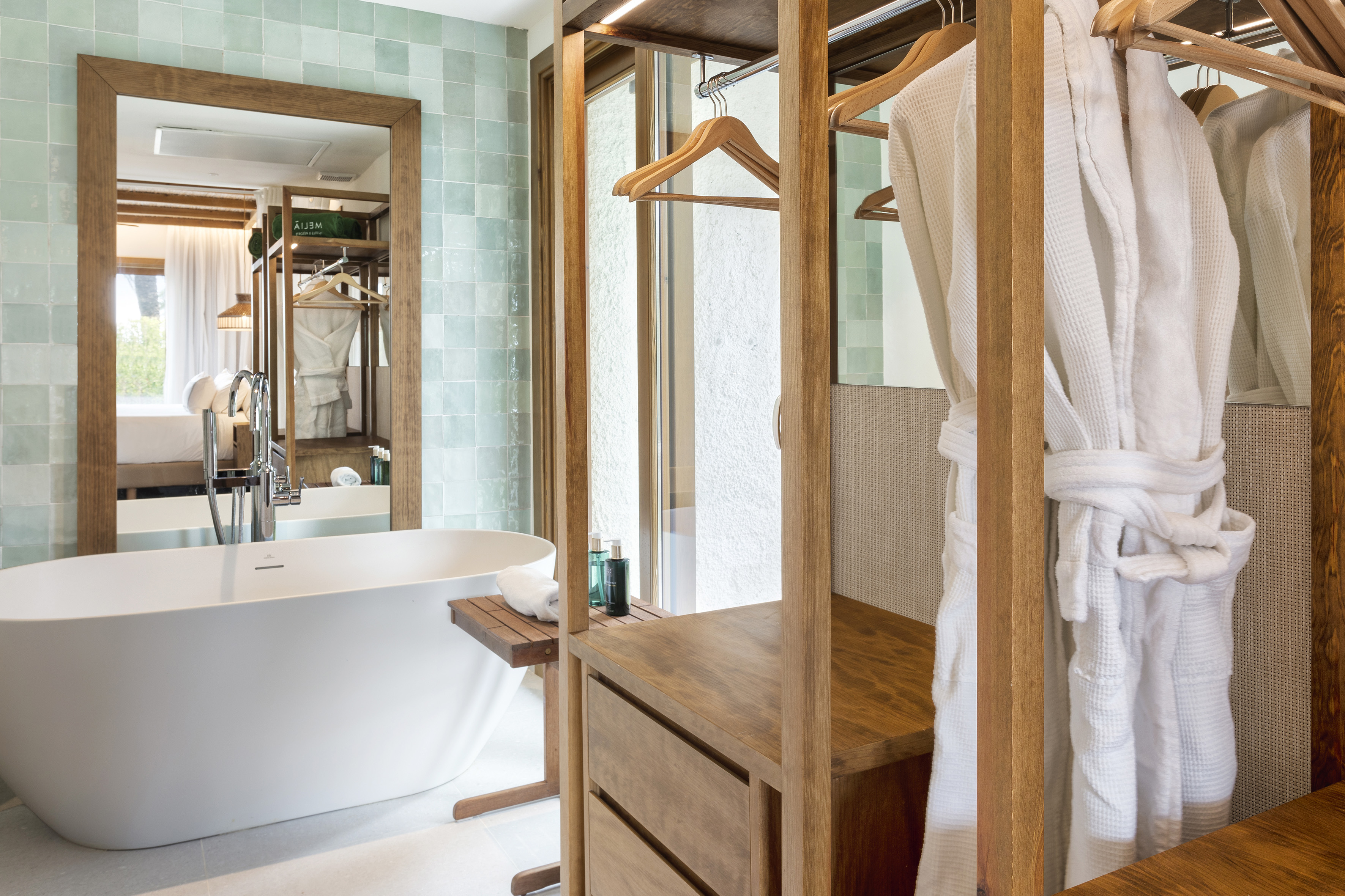 a bathroom with a bathtub and a bathtub