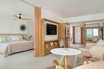 a room with a bed and a table