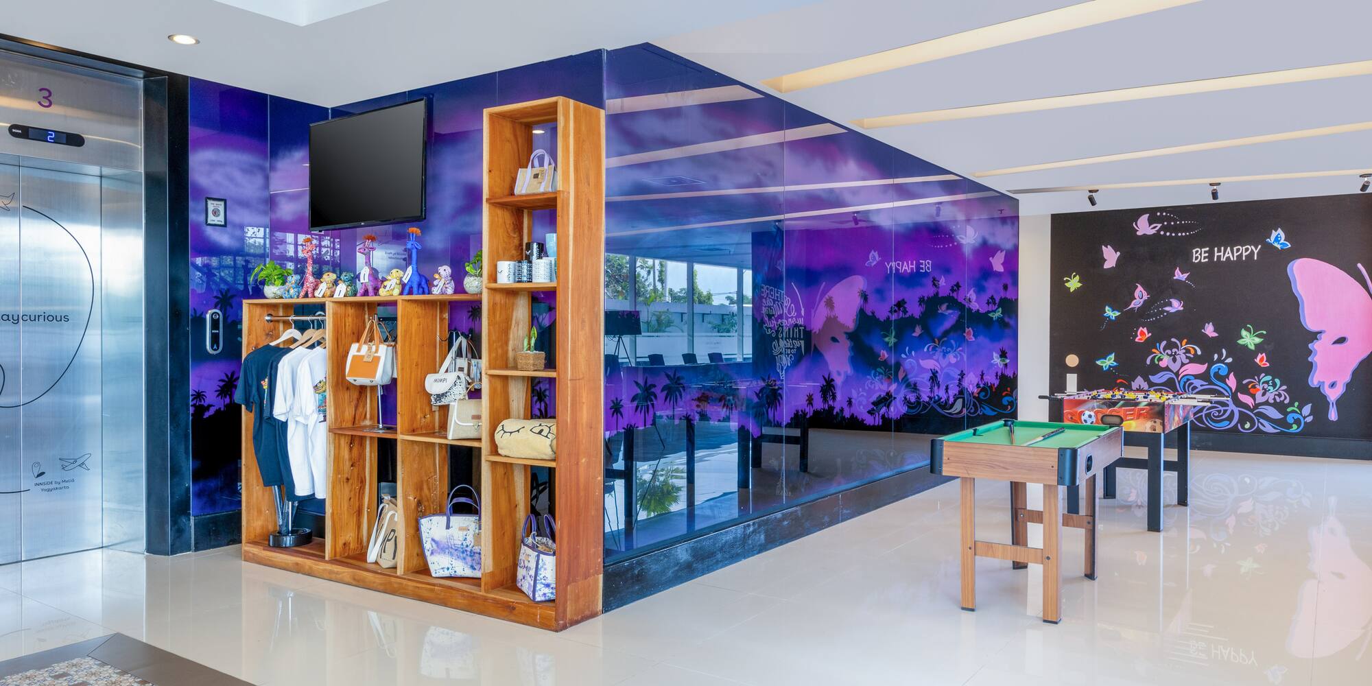 a room with a pool table and a pool table