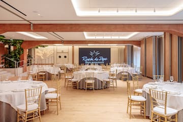 a room with tables and chairs