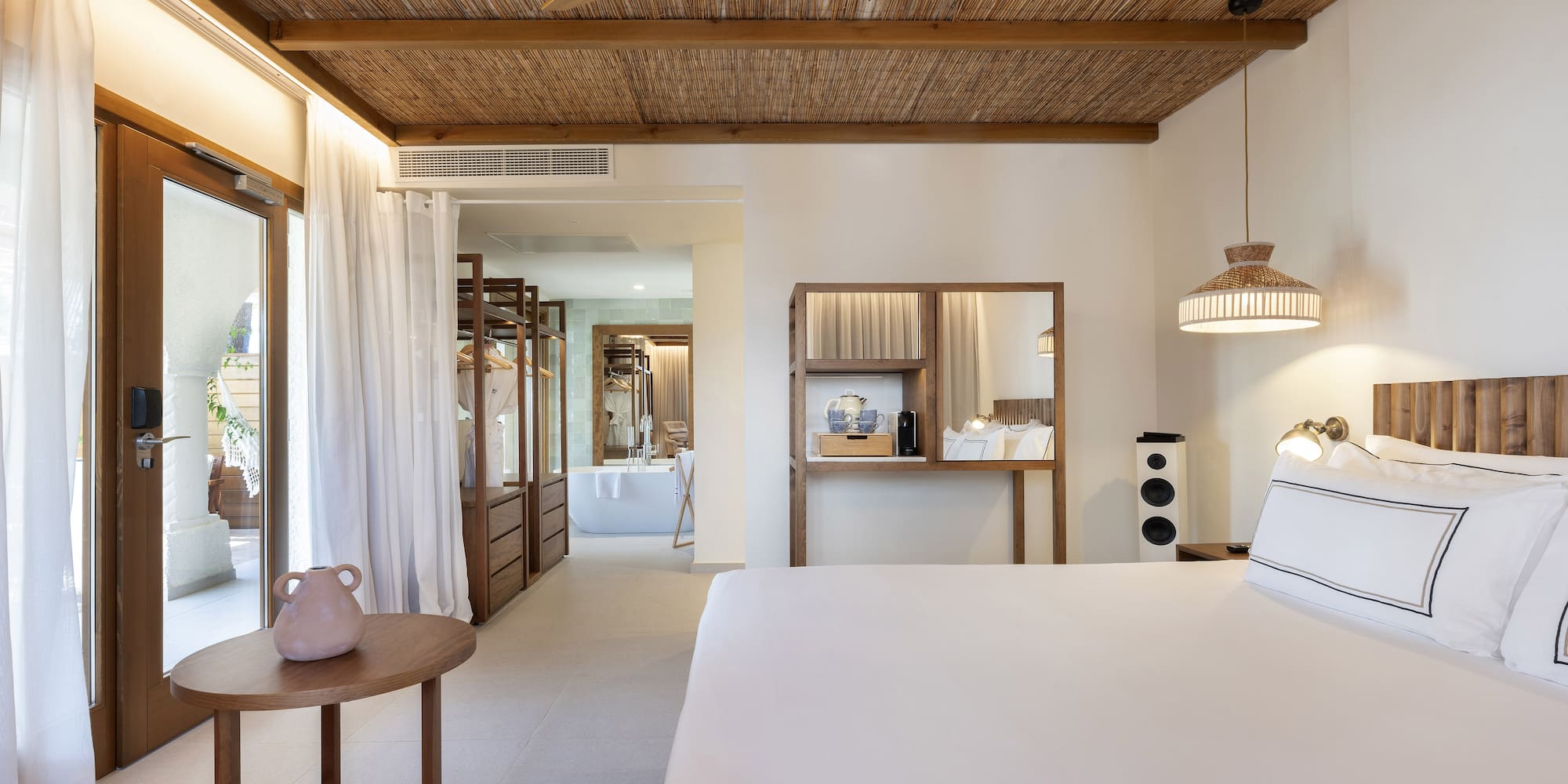 a room with a bed and a table