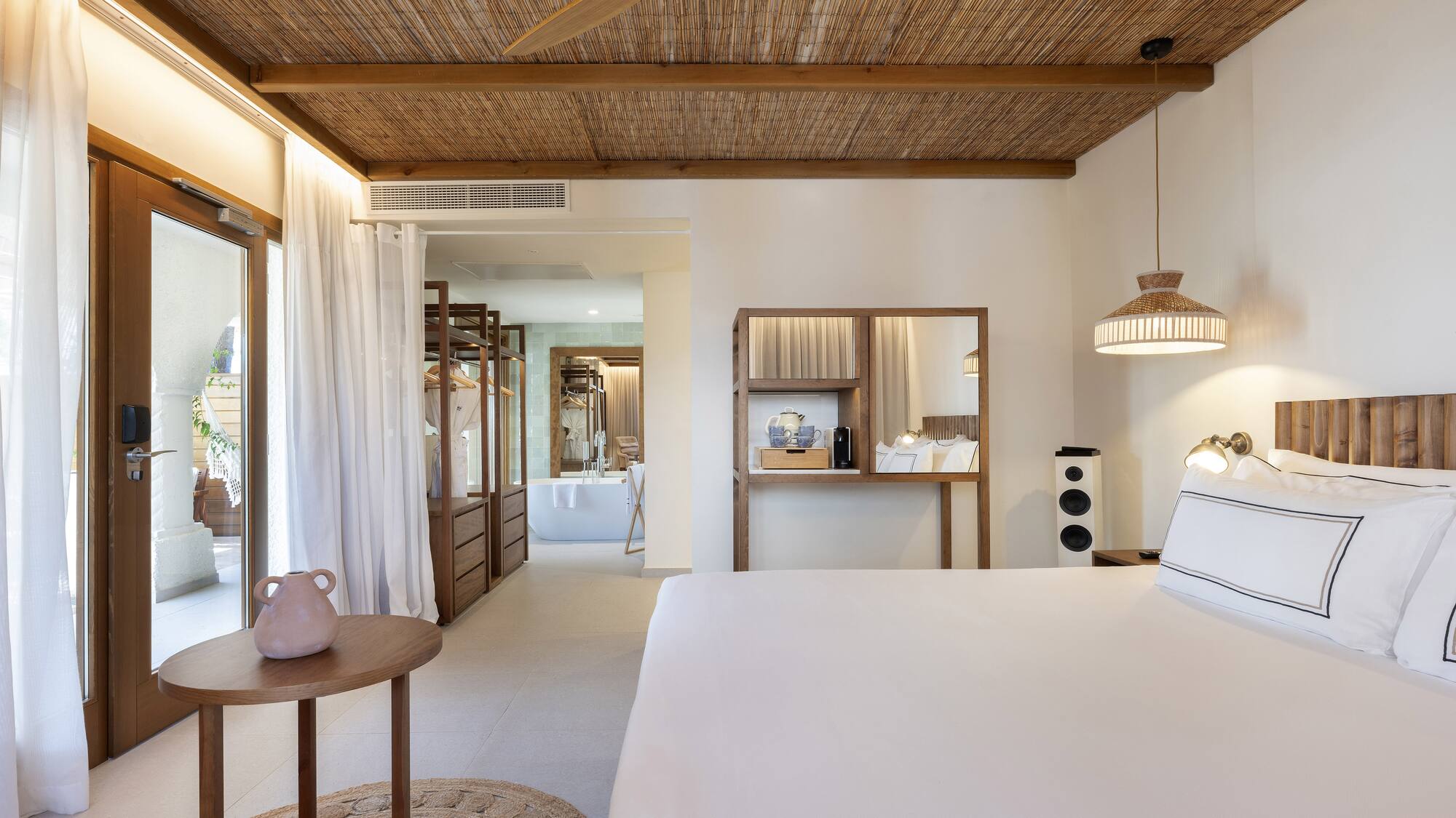 a room with a bed and a table