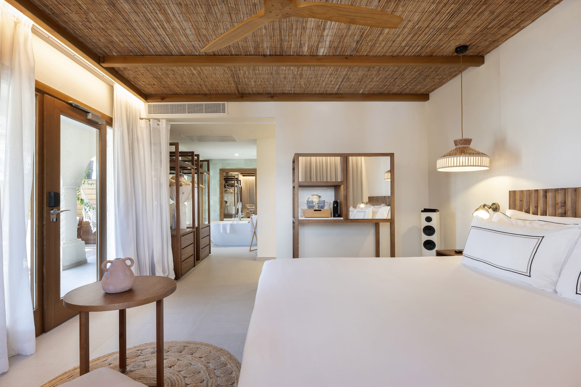 a room with a bed and a table