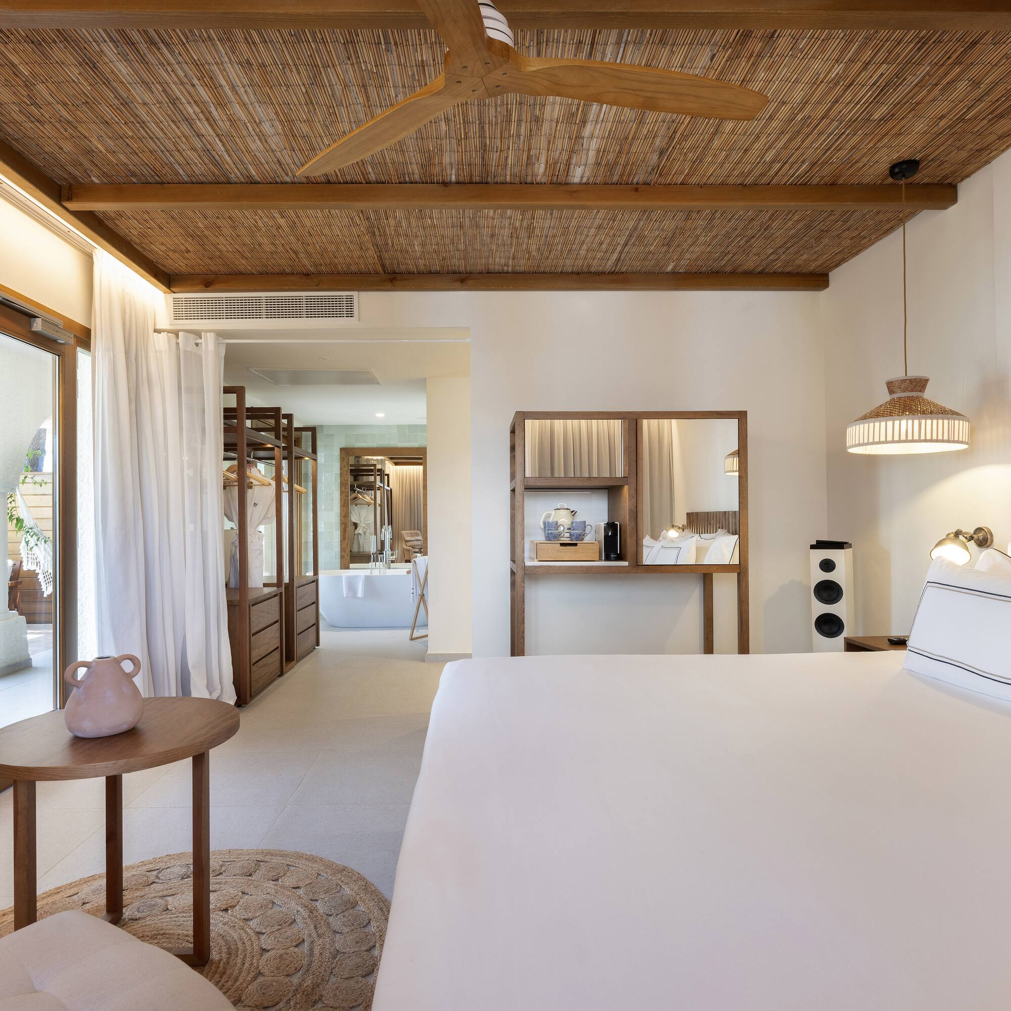 a room with a bed and a table