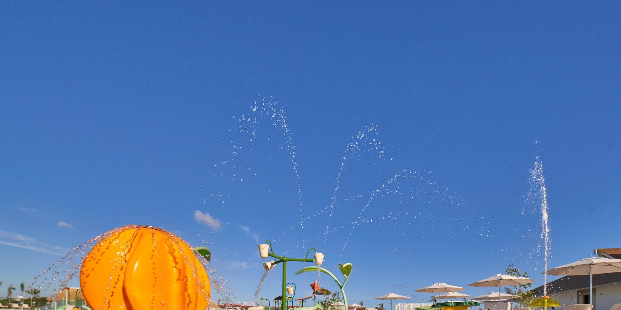 a water fountain with a ball in the water