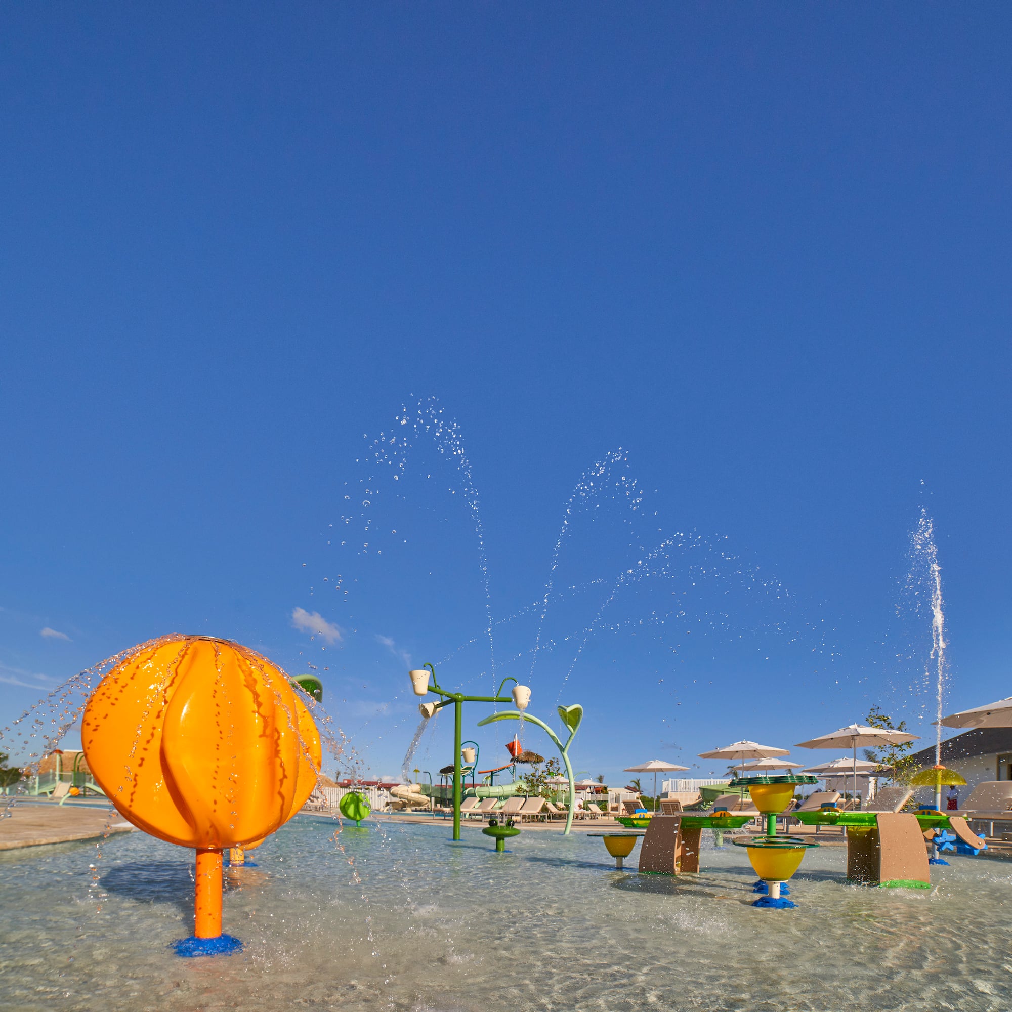 a water fountain with a ball in the water