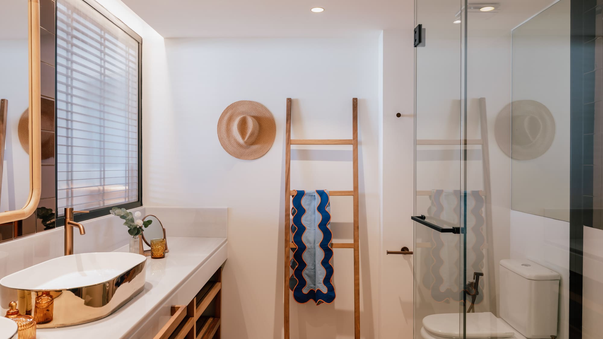 a bathroom with a sink and a shower