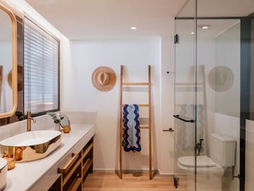 a bathroom with a sink and a shower