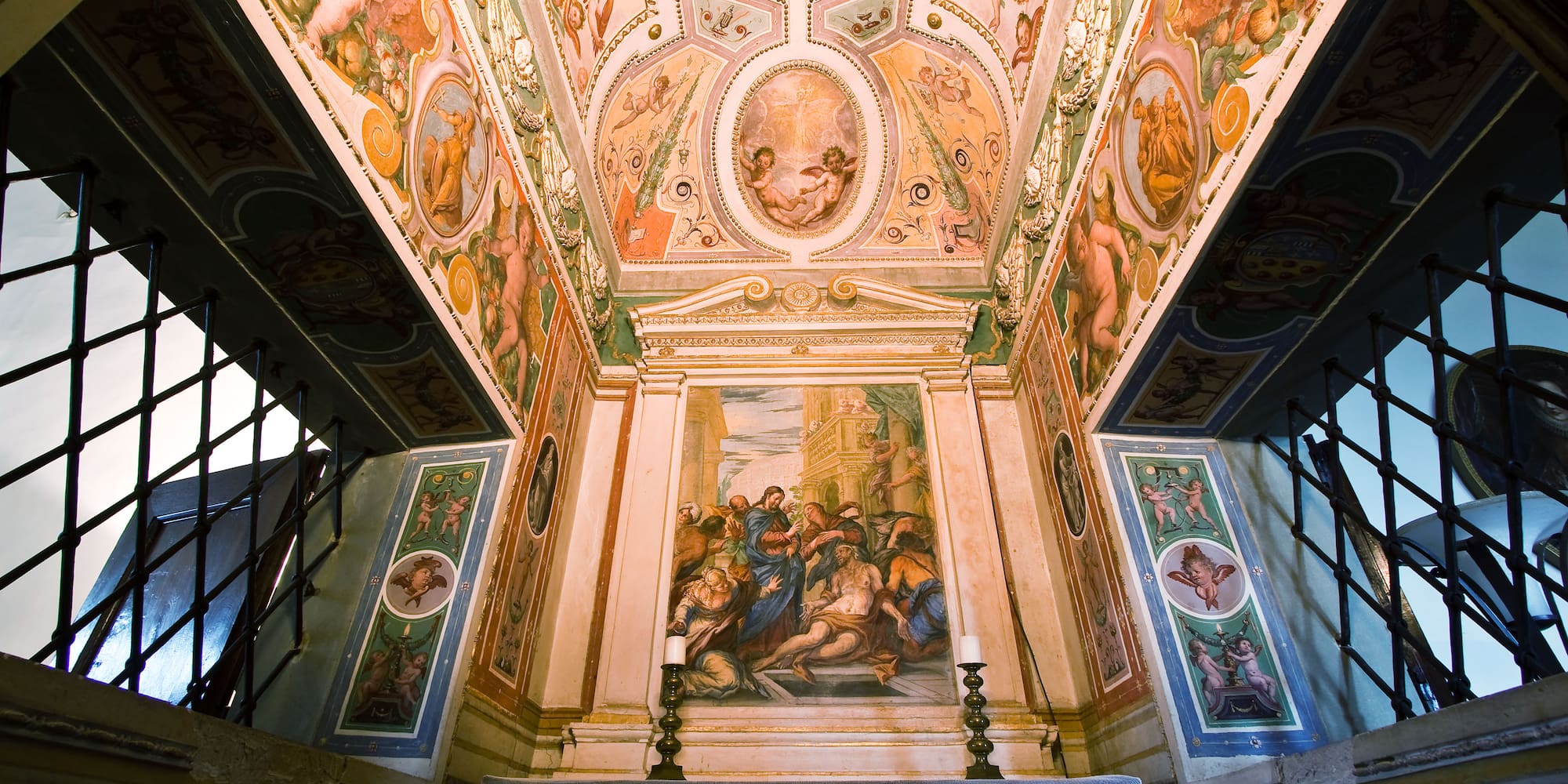 a ceiling with a painting on it