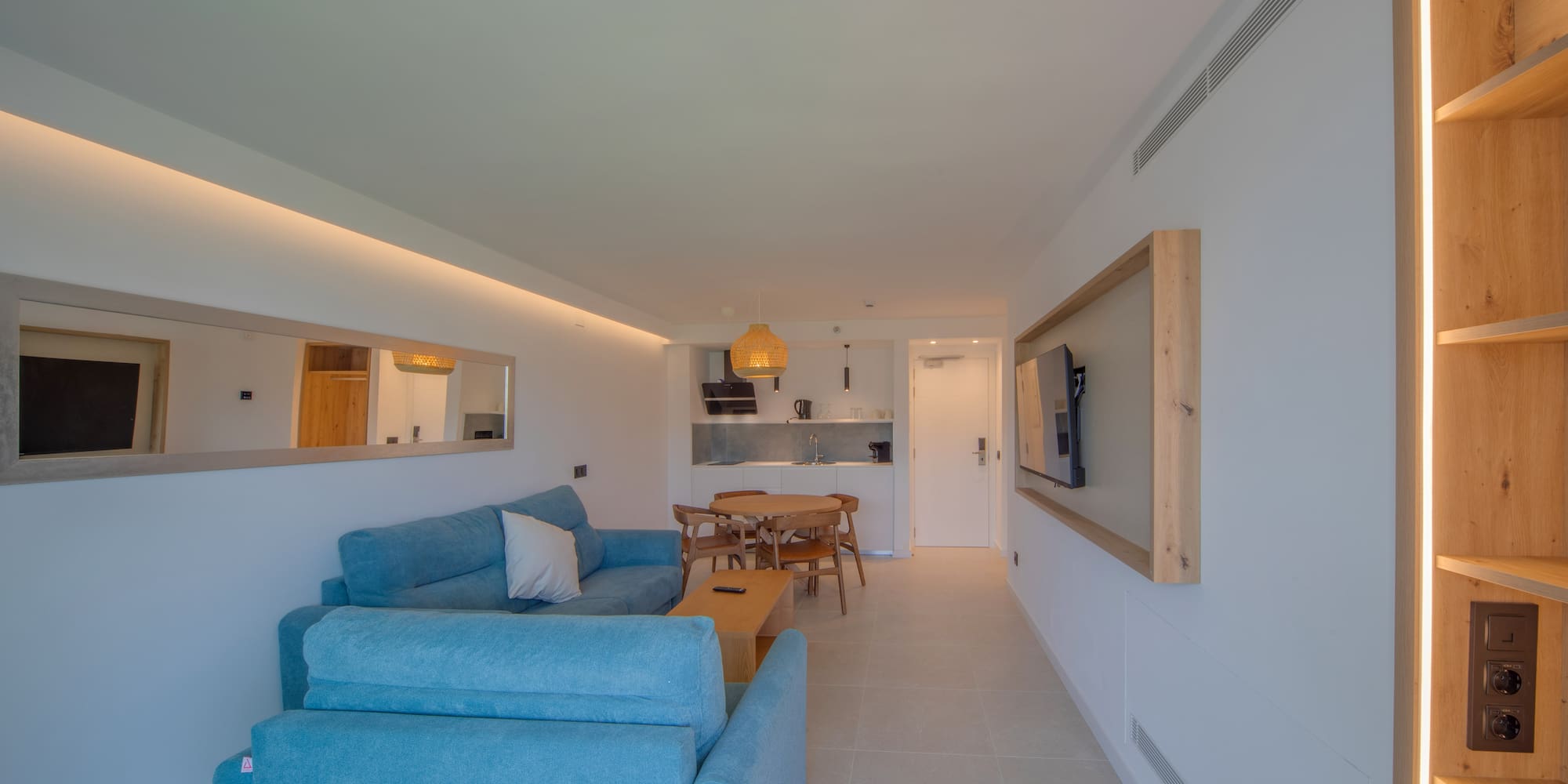 a living room with a couch and a table