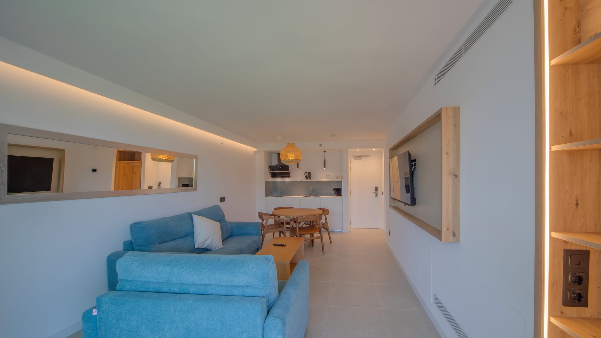 a living room with a couch and a table