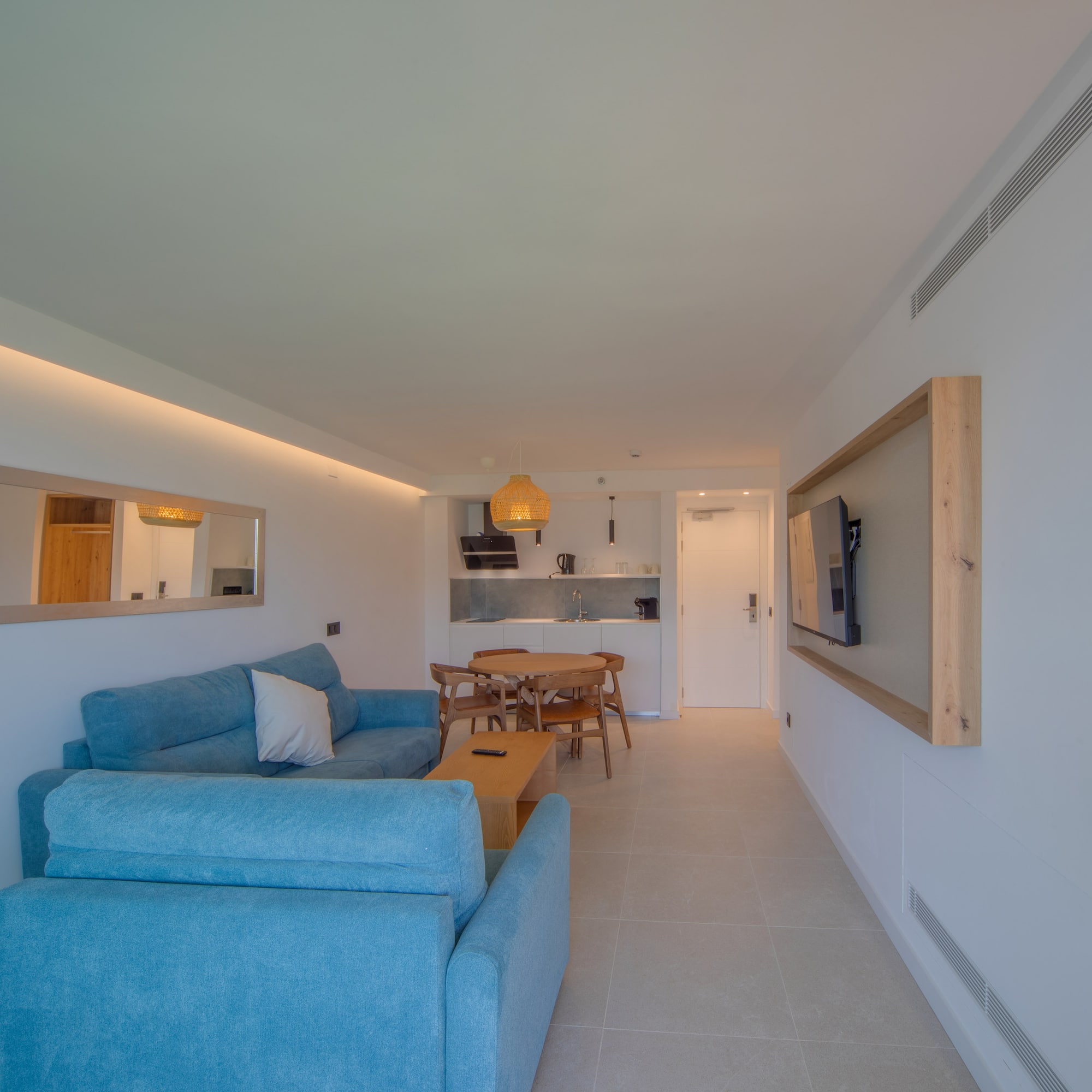 a living room with a couch and a table