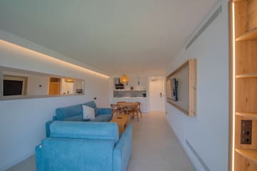 a living room with a couch and a table