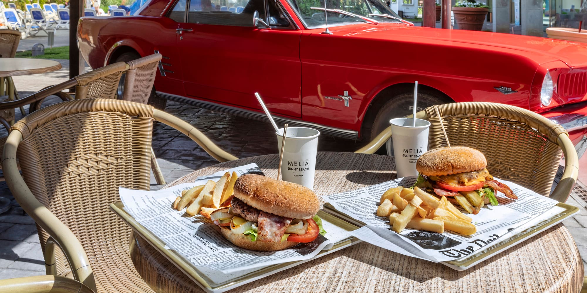 a two plates of food on a table