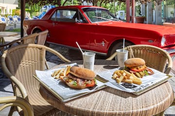 a two plates of food on a table