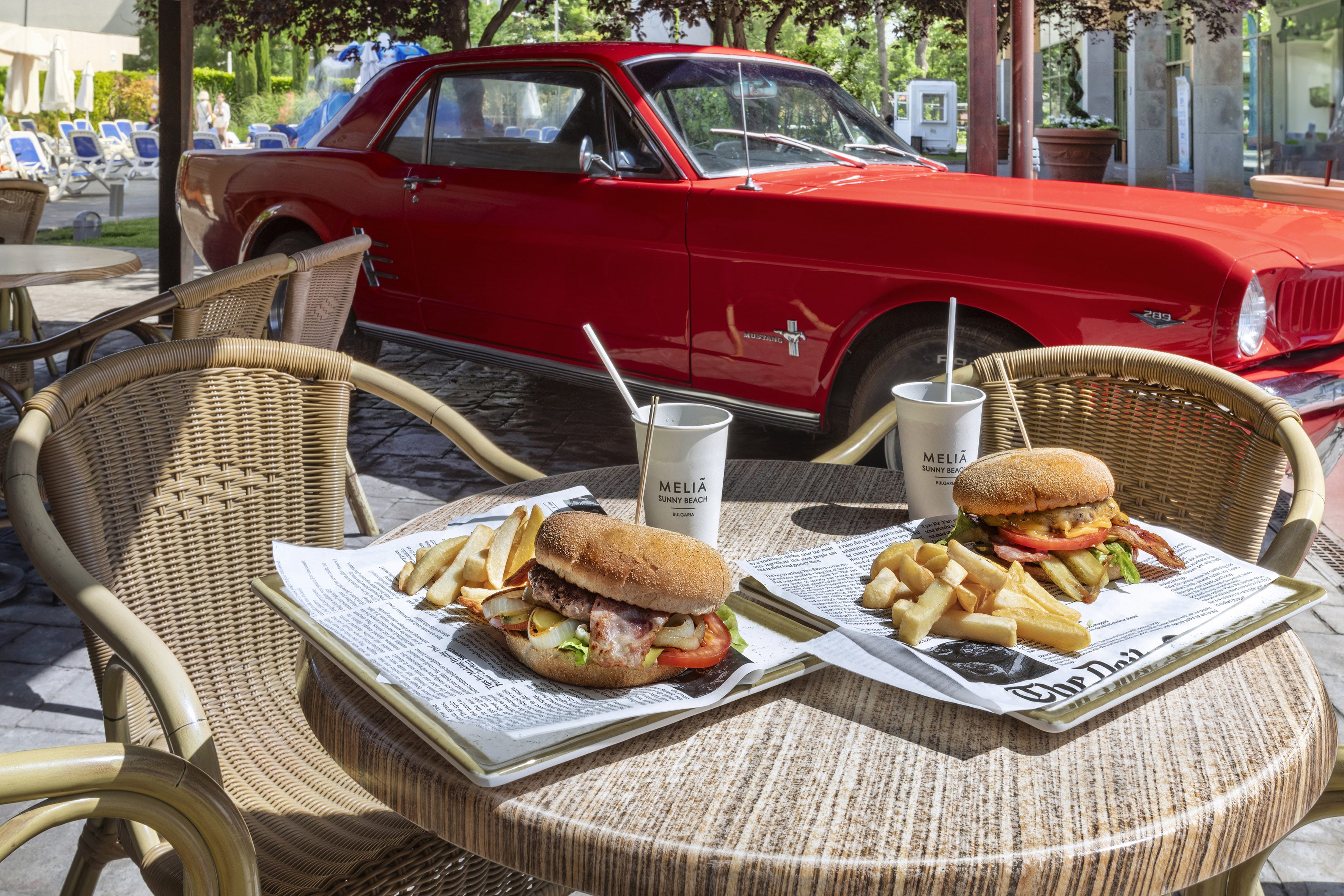 a two plates of food on a table