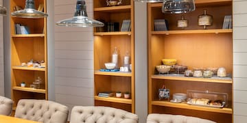 a room with a table and chairs