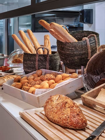 a variety of breads on a counter