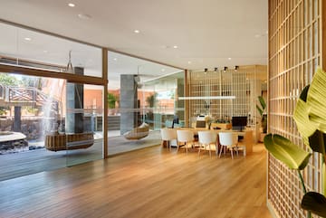 a room with a table and chairs